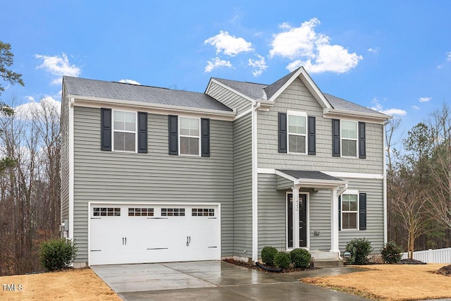 view of front of home featuring a garage