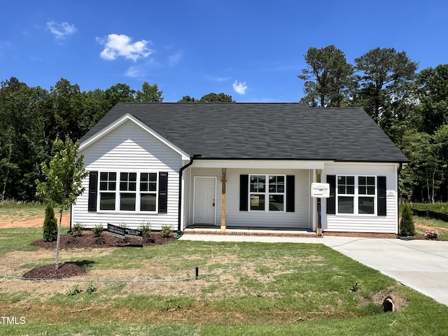 286 Longbow Dr, Middlesex, NC 27557 - view of front of property with a porch and a front lawn