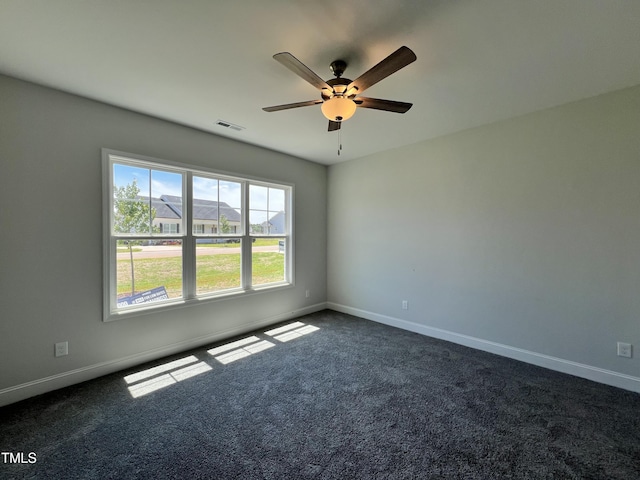 286 Longbow Dr, Middlesex, NC 27557 - empty room with dark carpet, a ceiling fan, and baseboards