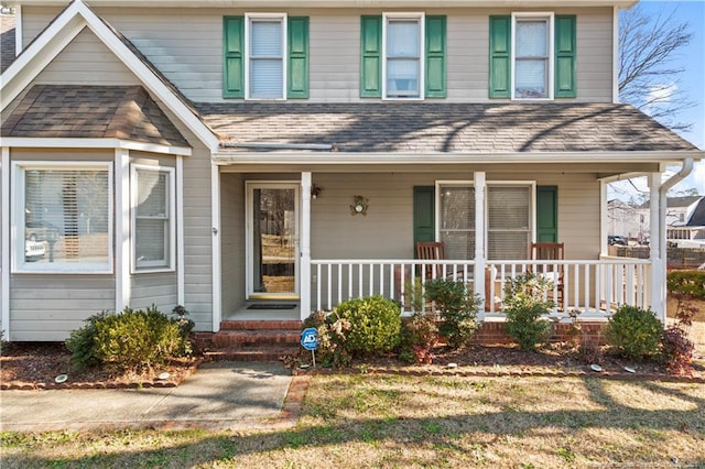 view of front of property featuring covered porch