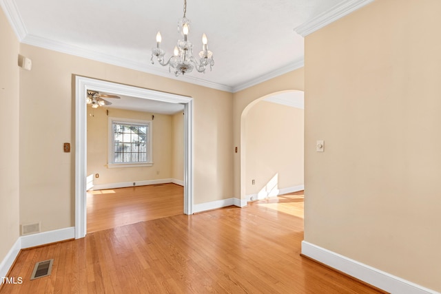 unfurnished dining area with wood-type flooring, ornamental molding, and ceiling fan