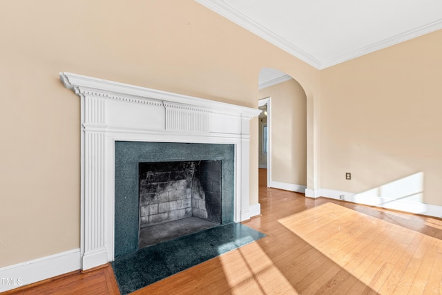 interior details with crown molding and wood-type flooring