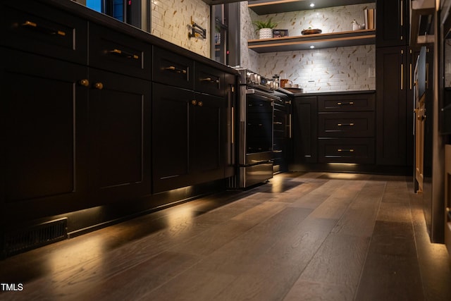 mudroom featuring dark wood-type flooring