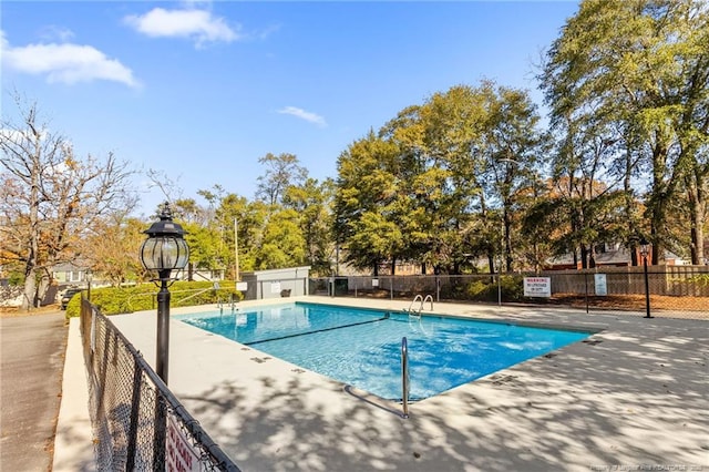 view of pool with a patio area