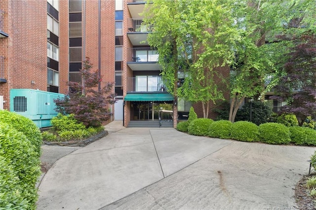 view of property featuring central AC unit