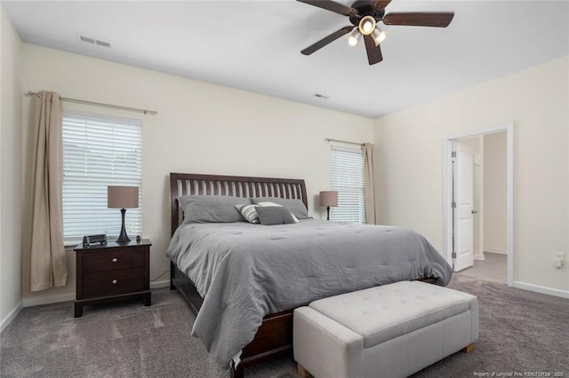 bedroom with ceiling fan and carpet floors