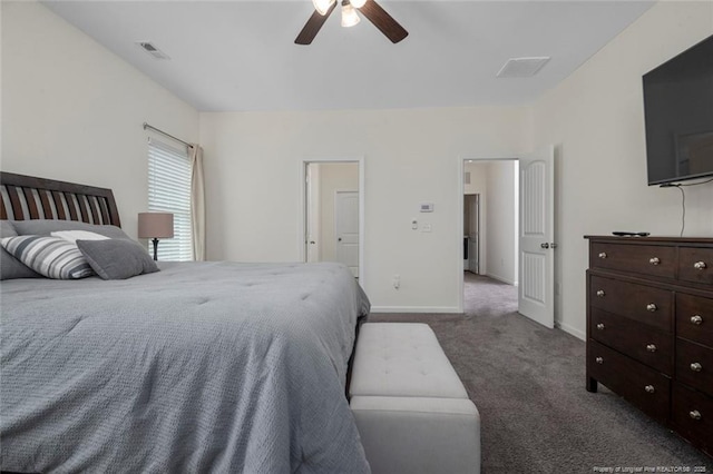 bedroom with ceiling fan and dark colored carpet