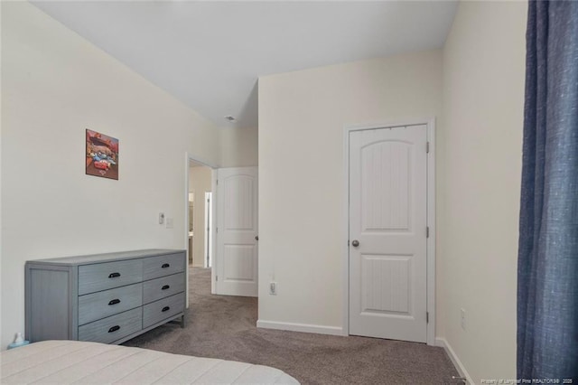 bedroom with light carpet