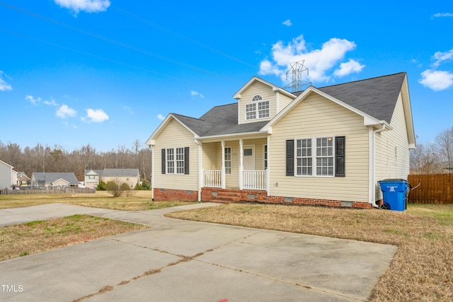 view of front of home with a front lawn and covered porch