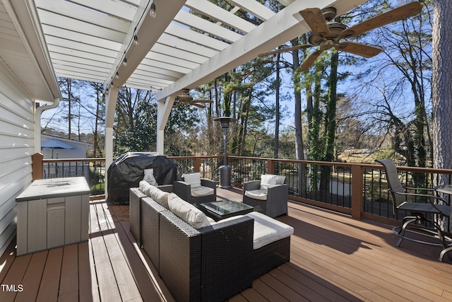 deck with ceiling fan, a pergola, and outdoor lounge area