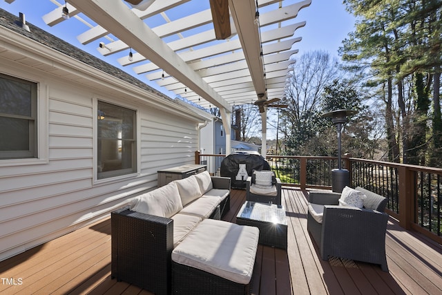 deck with an outdoor living space and a pergola