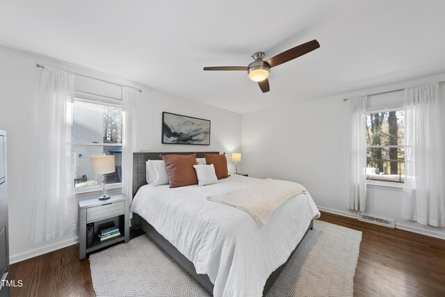 bedroom featuring ceiling fan and wood-type flooring