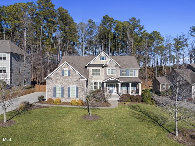 view of front of house with a front lawn and covered porch