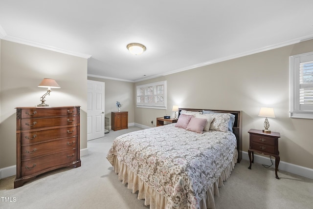 carpeted bedroom featuring ornamental molding