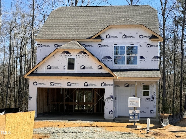 property in mid-construction featuring a garage