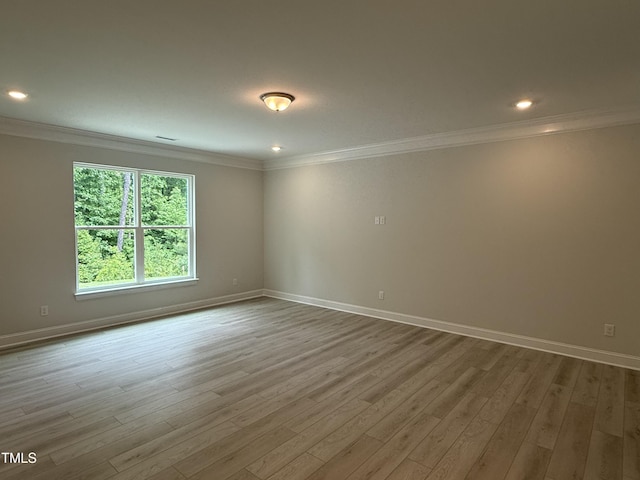 137 Stallion Way, Benson, NC 27504 - empty room with crown molding, wood finished floors, baseboards, and recessed lighting
