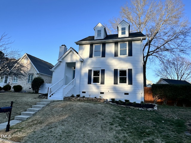 view of front of property featuring a front yard