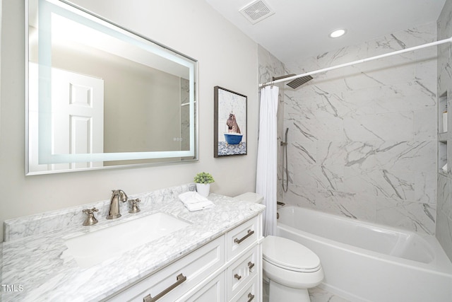 full bathroom with shower / bath combo with shower curtain, toilet, and vanity