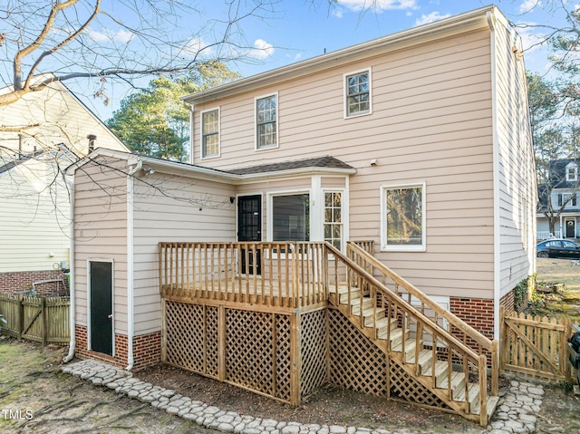 rear view of house with a deck