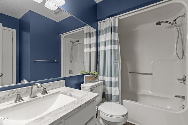 full bathroom with vanity, shower / bath combination with curtain, toilet, and a textured ceiling