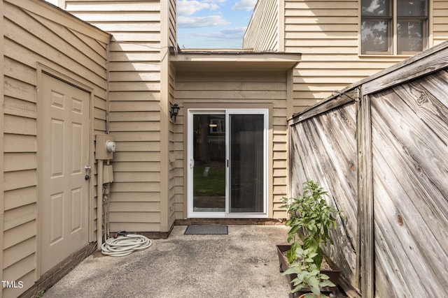 doorway to property featuring a patio area