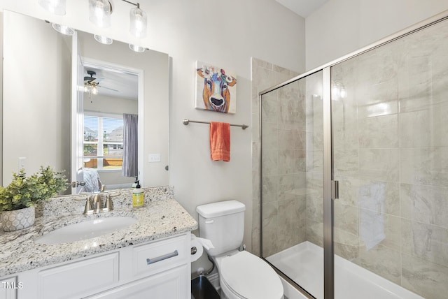 bathroom featuring ensuite bathroom, a stall shower, toilet, and ceiling fan