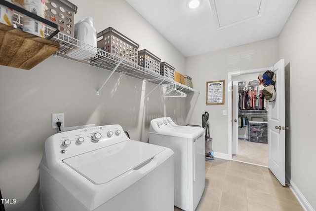 laundry area with laundry area, recessed lighting, baseboards, and washer and dryer