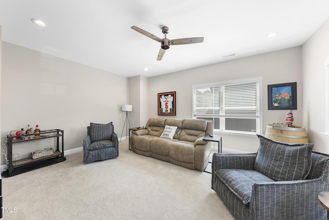 living area featuring baseboards, a ceiling fan, carpet, and recessed lighting
