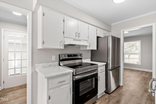 kitchen with white cabinetry, light wood-type flooring, and appliances with stainless steel finishes