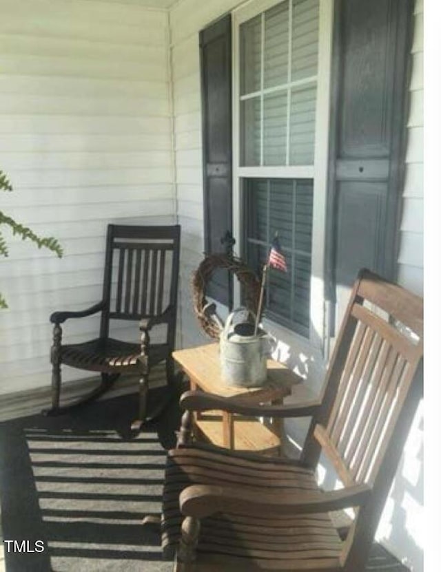 balcony featuring a porch