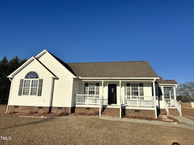 ranch-style house featuring a porch