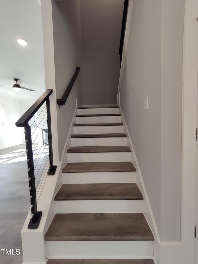 stairs featuring recessed lighting and baseboards