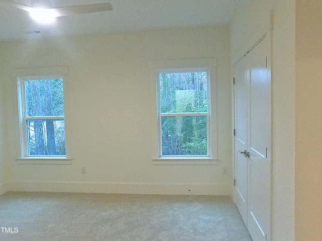 spare room featuring baseboards