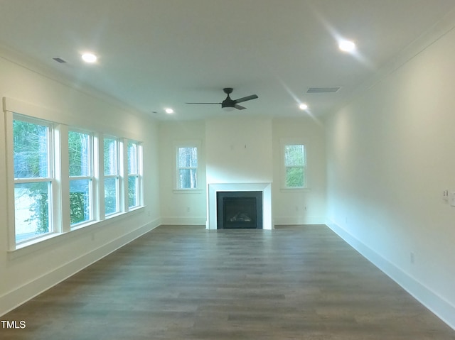 unfurnished living room with a fireplace, baseboards, dark wood finished floors, and recessed lighting