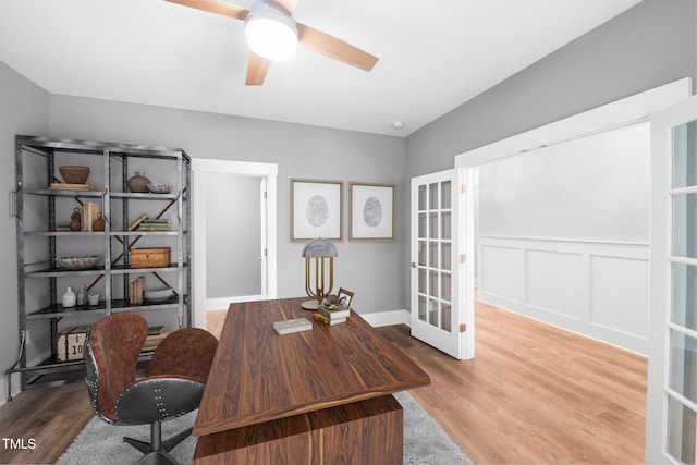 632 Angus Ct, Sanford, NC 27332 - office with wood finished floors, a ceiling fan, french doors, and wainscoting