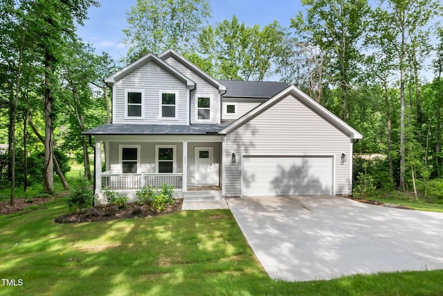 632 Angus Ct, Sanford, NC 27332 - traditional-style house featuring covered porch, a garage, concrete driveway, a front lawn, and roof with shingles