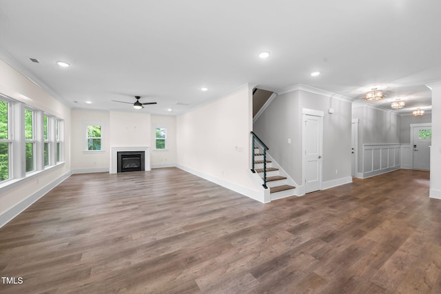 632 Angus Ct, Sanford, NC 27332 - unfurnished living room featuring crown molding, a ceiling fan, wood finished floors, a fireplace, and recessed lighting