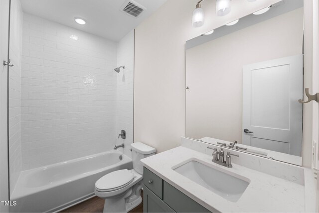 632 Angus Ct, Sanford, NC 27332 - bathroom featuring vanity, toilet, and bathing tub / shower combination