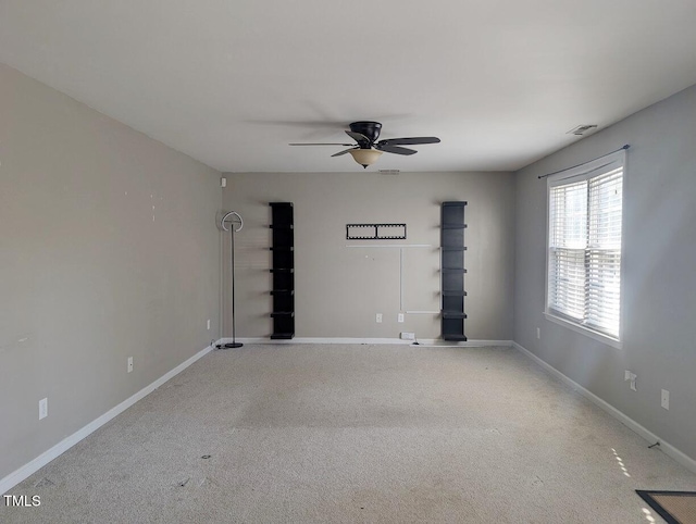 spare room with ceiling fan