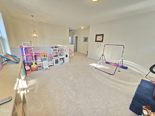 playroom with light colored carpet