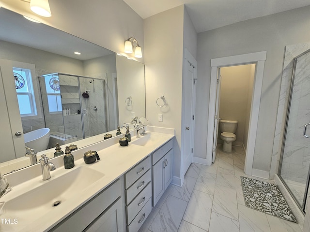 full bathroom featuring toilet, vanity, and shower with separate bathtub