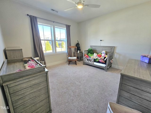 carpeted bedroom featuring ceiling fan