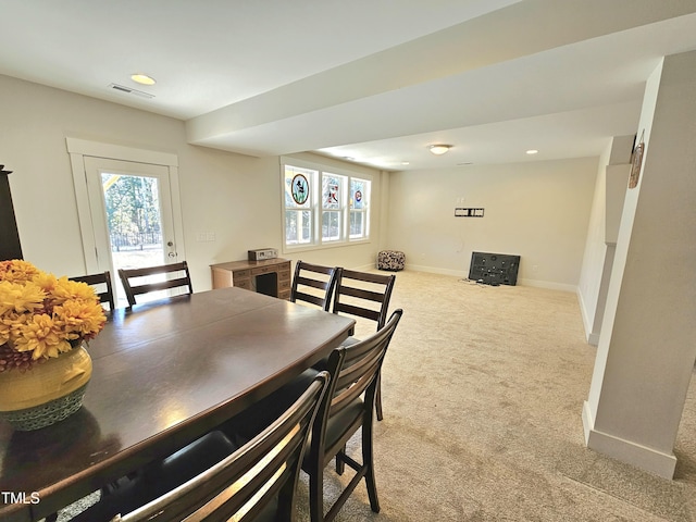 dining room featuring carpet