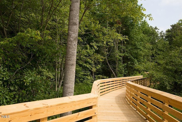 view of property's community featuring a view of trees