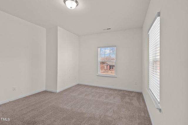 view of carpeted spare room