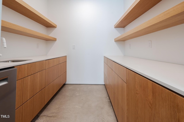 kitchen featuring dishwasher and sink