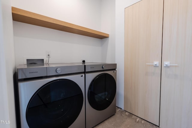 washroom featuring independent washer and dryer