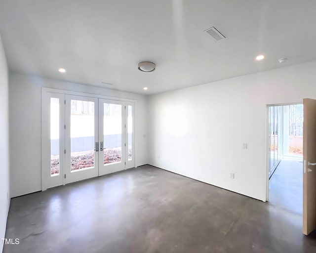 spare room with french doors