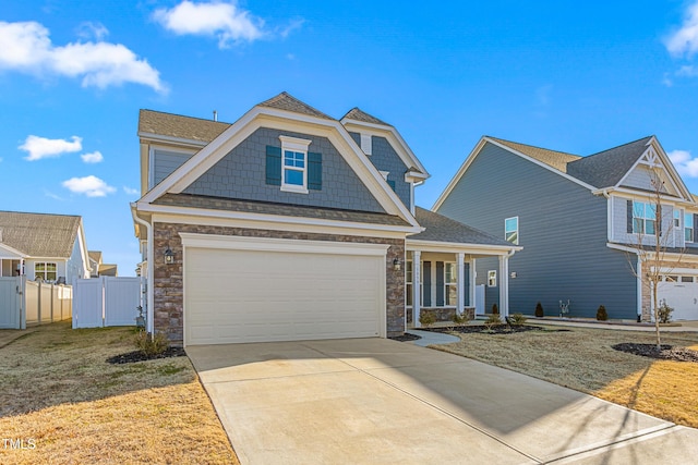 view of front facade with a front yard and a garage