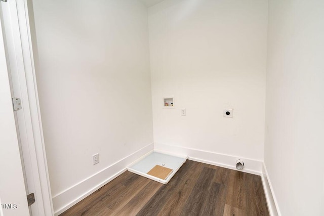 washroom with hookup for a washing machine, hardwood / wood-style floors, and hookup for an electric dryer